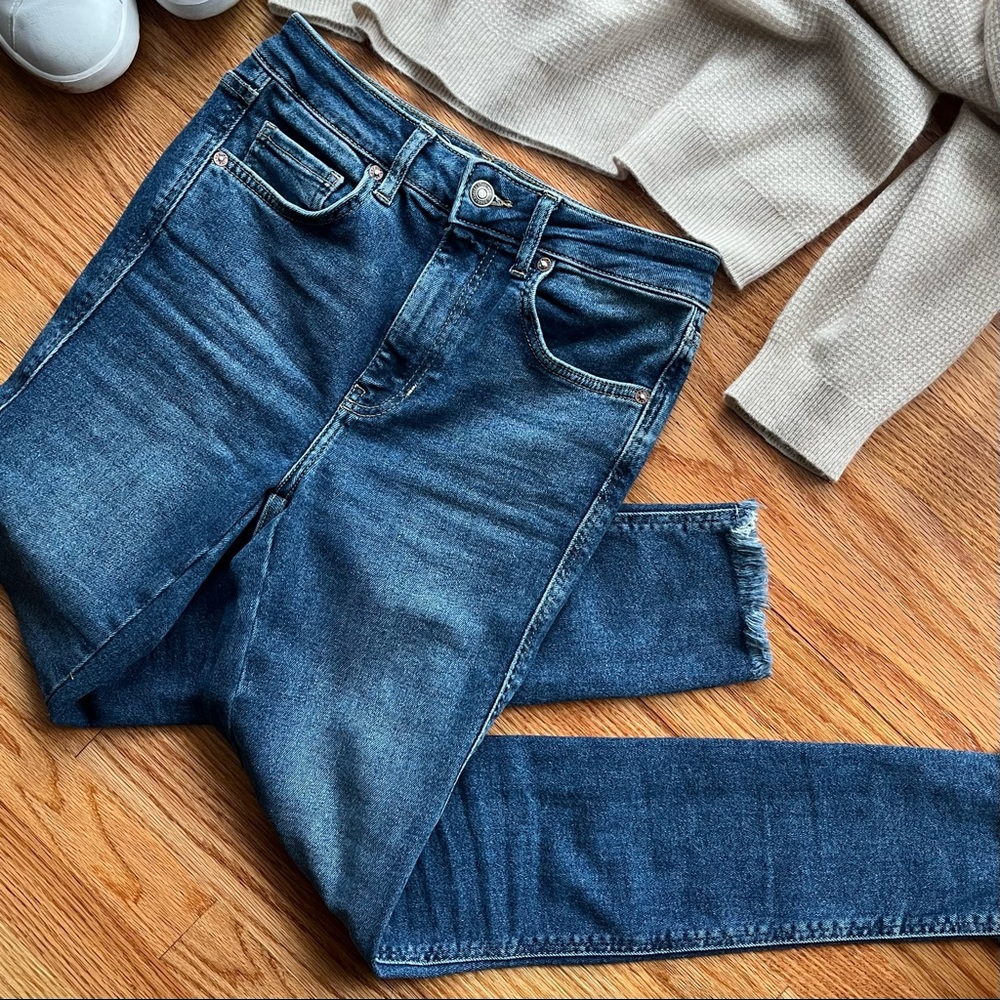 FREE PEOPLE High Waisted Fringe Hem Jeans